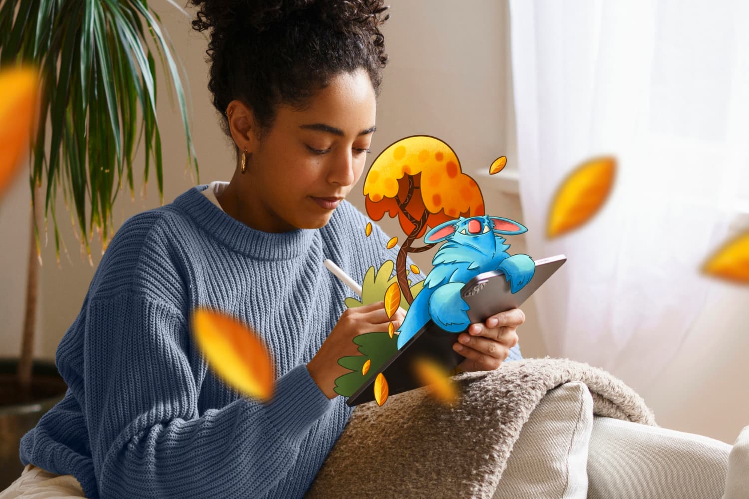 Designer reviewing an illustrated character on a tablet