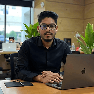 WebblyHosting specialist sitting behind a laptop